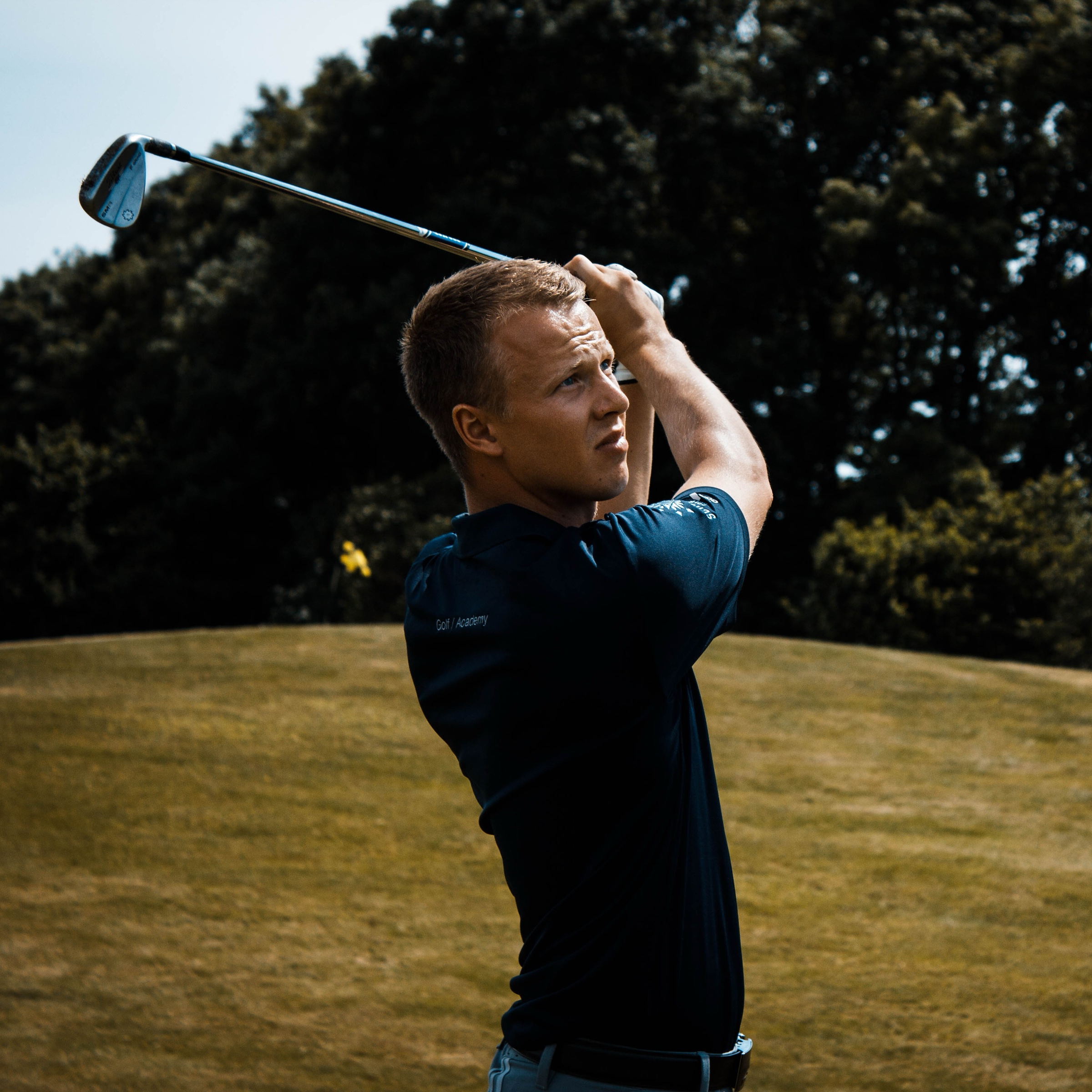 Birk at the golf academy in Germany, at the finish of a swing